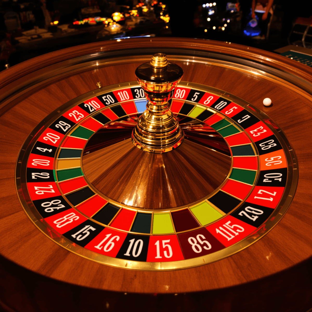 A realistic roulette wheel spinning with colorful numbers and a small white ball landing on one, symbolizing chance in casino gaming.