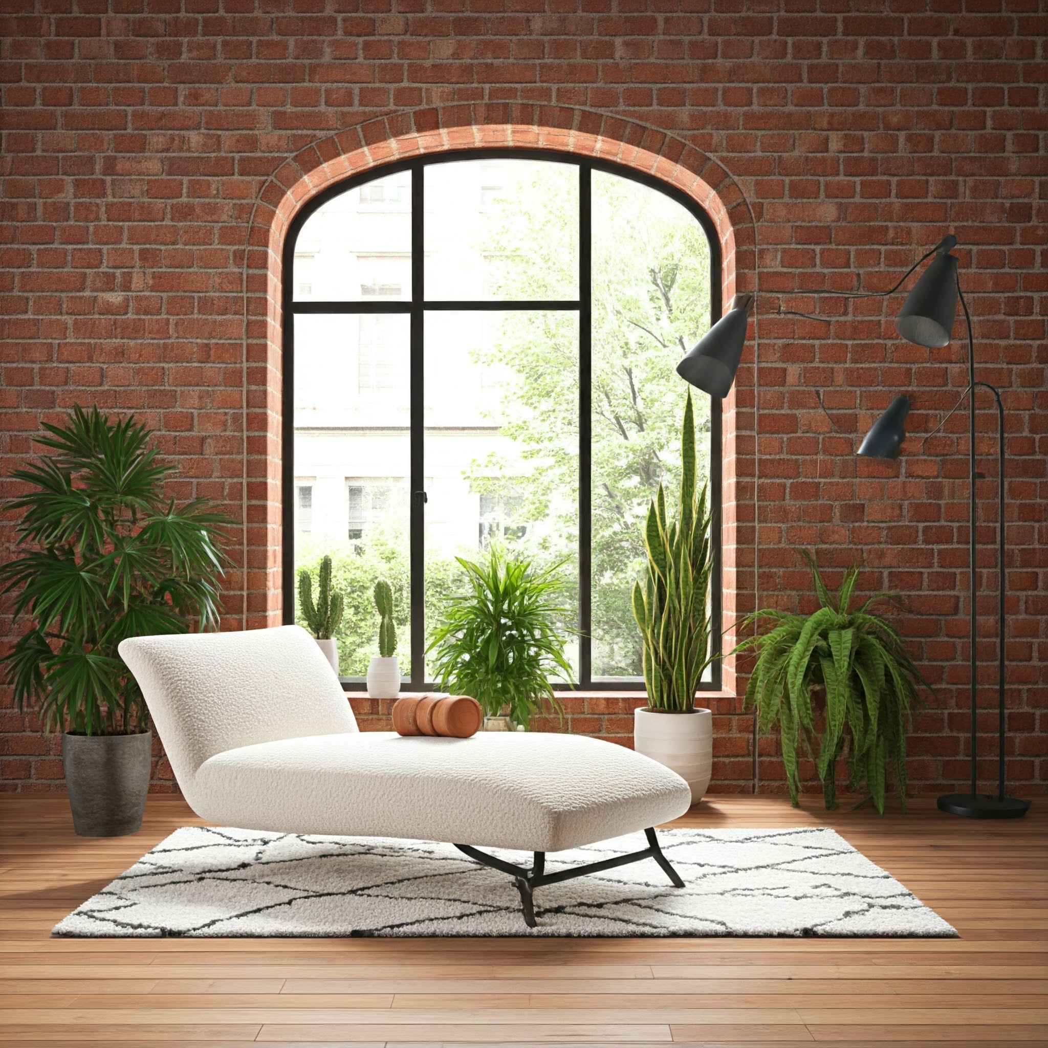 A cozy reading nook or lounge area featuring a cream bouclé chaise lounge centered on a black and white geometric area rug, placed against an exposed brick wall with a large arched window and various potted plants, showcasing ideal rug size for a dedicated relaxation space.