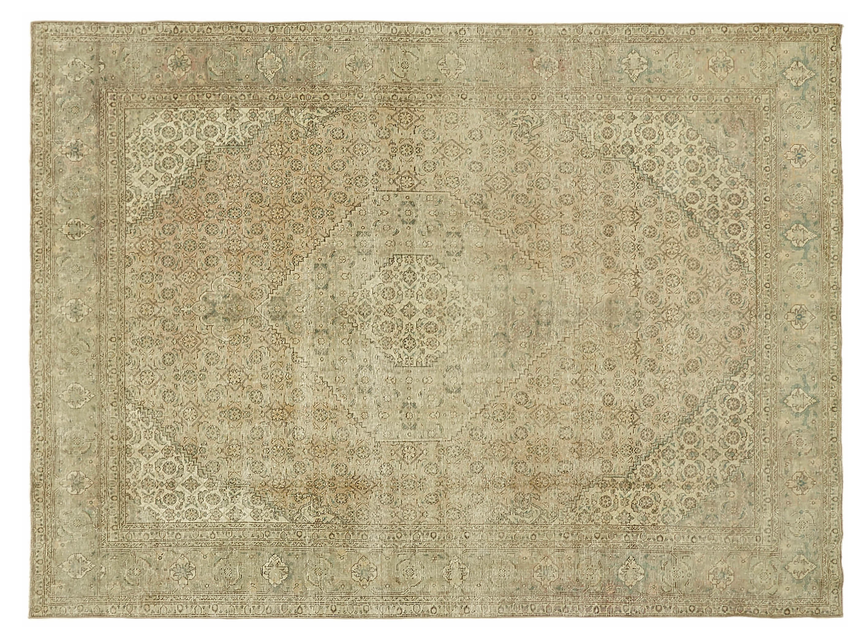 A large, vintage-style beige and ivory hand-woven rug with a traditional medallion pattern, ideal for creating a calm and timeless living space