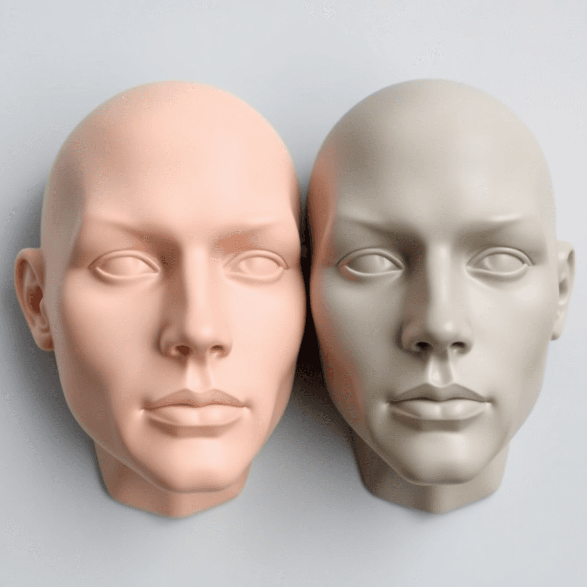 new freen gold Close-up of two realistic human face masks side by side, one smooth and translucent silicone, the other matte and solid latex, on a neutral background.
