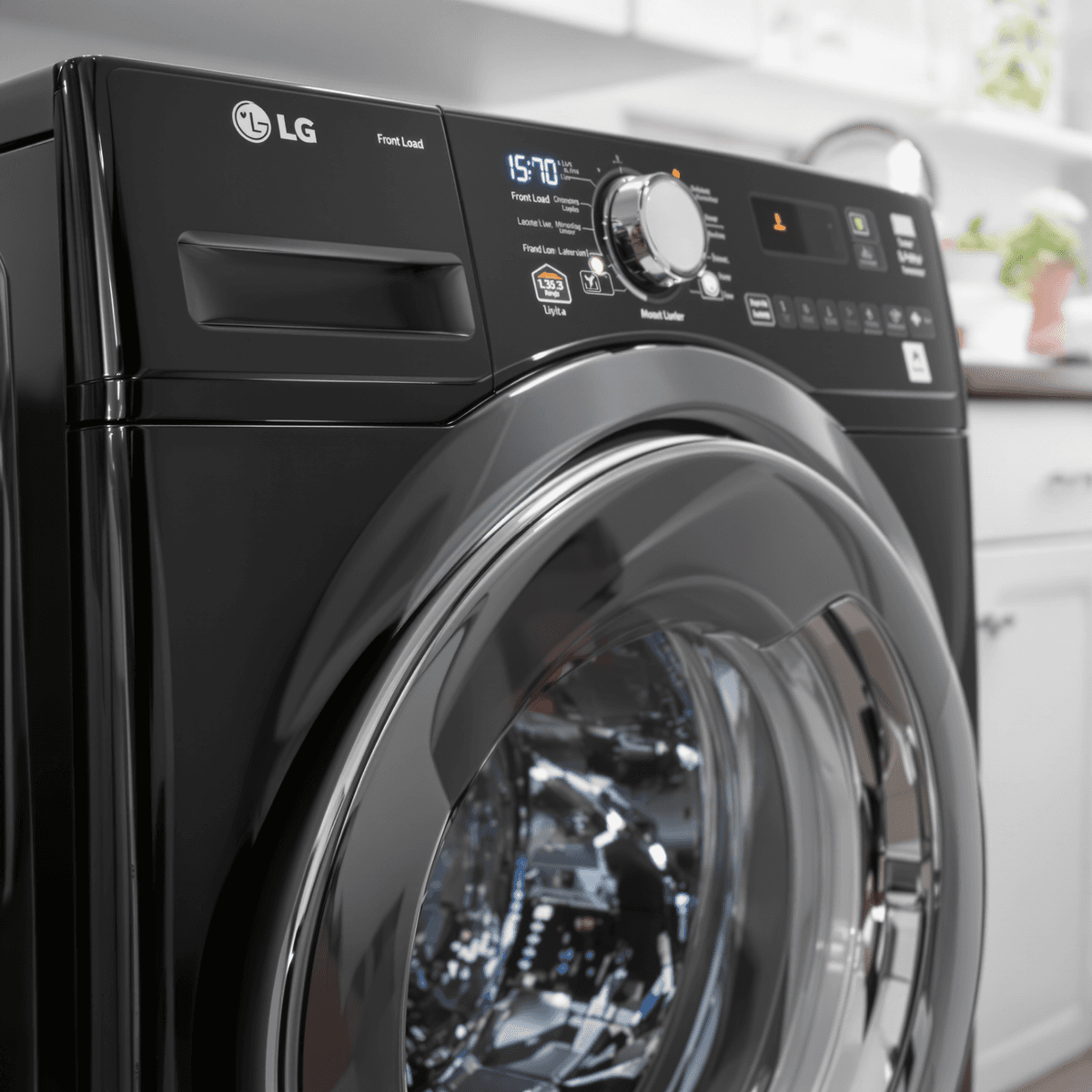 A modern black LG front load washing machine in a bright, clean laundry room with glowing digital touch panel icons.